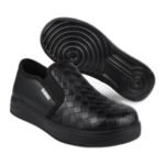Boys' black woven-texture slip-on school shoes with a ridged cupsole