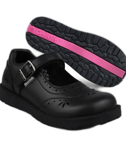 Girls' black leather buckle school shoes with punched floral detail and a pink sole stripe