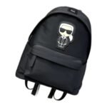 Kids' black nylon mini backpack with a cartoon figure patch