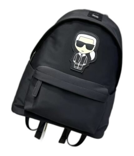 Kids' black nylon mini backpack with a cartoon figure patch