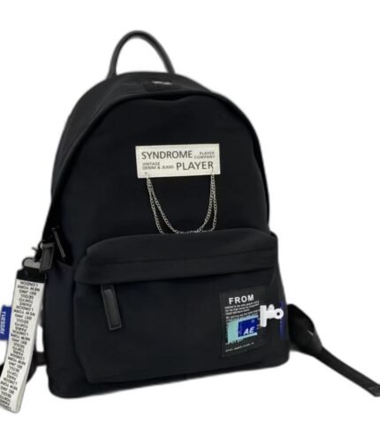 Kids' black nylon school backpack with a woven label and chain detail