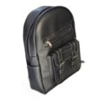Handmade black leather kids' backpack with a zip pocket and twin buckle pockets