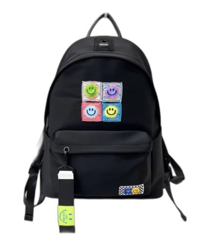 Kids' black nylon school backpack with four colourful smiley face patches