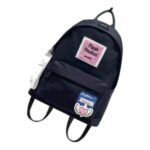 Kids' navy nylon school backpack with a pink front patch and a winged heart badge