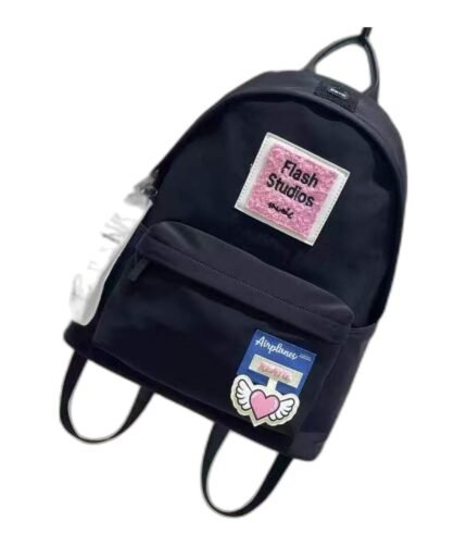 Kids' navy nylon school backpack with a pink front patch and a winged heart badge