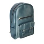 Handmade teal leather kids' backpack with a zip pocket and twin buckle pockets